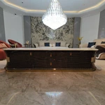 Oval White Marble TV Stand with Cream Diamond-Stitched Leather Trim and Dark Glossy Panels